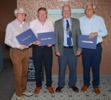Seen with outgoing President Jim Henry are newly installed Paul Harris Fellows (from left) Alan Shannon, Terry Cromey and Grahame Fraser